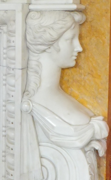 Carving of young woman